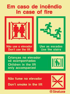 Sinal de em caso de incêndio não usar o elevador usar as escadas + não fumar no elevador